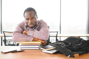 Portrait of african university student in class looking at camera photo