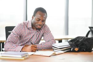 African American student passing exam photo