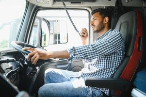 Portrait of a indian truck driver. photo