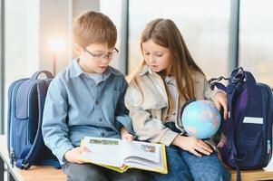 Portrait of two schoolchildren a boy and a girl photo