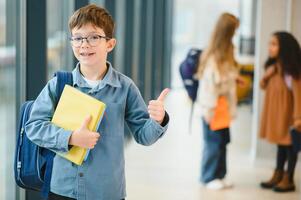 cheerful elementary school students. Back to school photo