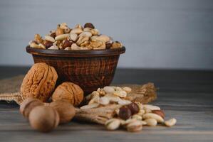 mix nuts on a wooden table photo