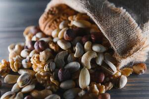 a mix of nuts in a craft bag photo