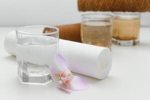 Water filters. Concept of three glasses on a white background. Household filtration system. photo