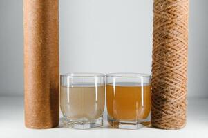 used water filters, glasses with dirty water photo