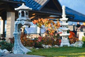 Fountain in the park garden. Water flows from the fountain. photo