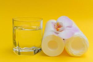 cartridges for water purification on a yellow background. Concept of clean water at home photo