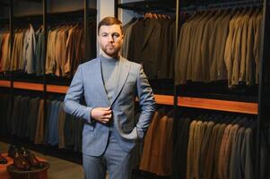 Perfect to the last detail. Modern businessman. Fashion shot of a handsome young man in elegant classic suit photo