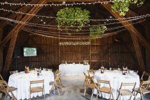 beautifully laid tables with glasses and appliances at morning in restaurant. photo