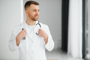 Portrait of an handsome young doctor photo