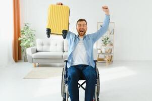 A person with disabilities at home with a suitcase is preparing for vacation. Leisure concept photo