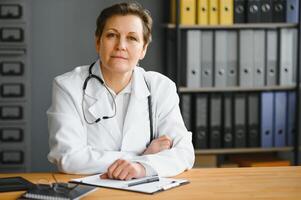 Portrait of a middle aged female doctor photo