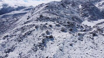 Volcanic slopes of Elbrus are covered with snow in summer video