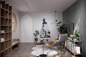 Modern minimalist dark gray loft style studio apartment interior design. sitting area. photo