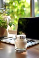 AI generated Blue Light Sunscreen protection cream near laptop. AI generated photo