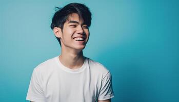 AI generated Young male asian wear white t-shirt isolated on blue background with copy space for your text, generative AI photo