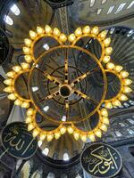 17 of April 2023 - Istanbul, Turkey - Interior decoration of Hagia Sofia, beautiful chandelier photo