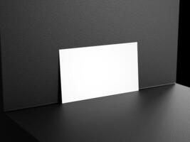 Elegant business card on black platform background photo