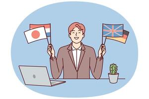 Satisfied man sits at table with laptop and shows flags of different countries. Vector image