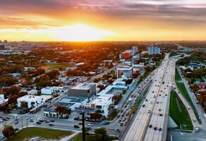 Aerial View of Miami City at Sunset. Capture the breathtaking aerial view of Miami city during a mesmerizing sunset. photo