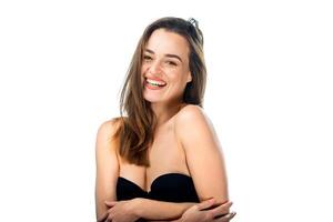 Woman in Black Bra. A woman in a black bra posing for a picture photo