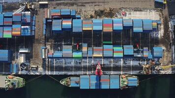 Shipping container close-up in seaport aerial view Shipping container key in waterborne freight. Shipping container vital for global trade efficiency Essential linking economies pivotal in logistics. video