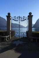 a gate with a star on it on lugano lake photo