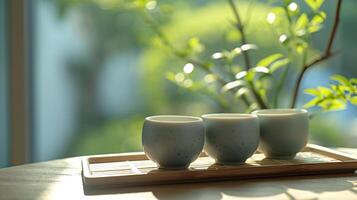 ai generado calmante té descanso con blanco cerámico tazas en bambú bandeja foto