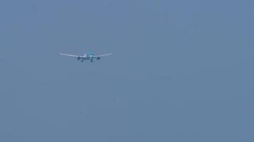 PHUKET, THAILAND - FEBRUARY 22, 2023. Widebody airplane Boeing 787-8 Dreamliner, G-TUIH of TUI approaching landing at Phuket International Airport, long shot, front view video