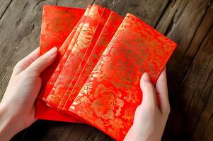 AI generated Money in red envelopes to be distributed for good luck during Chinese New Year photo