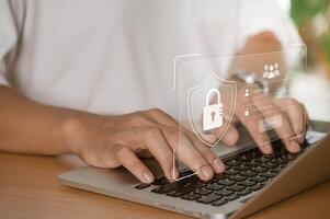 Cybersecurity protects passwords and secure internet access. It is crucial to have secure login and protection in the online world. Users enter their passwords on the internet network to stay safe photo