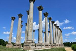 Large Stone Pillars Reaching Up to Skies photo