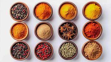 AI generated Assorted spices in terracotta pots on white, top view. Ideal for culinary backgrounds. photo