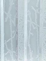 winter vertical frosty background with snow patterns on ribbed texture photo