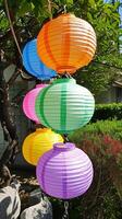 AI generated Vibrant Array of Paper Lanterns in Daylight Splendor photo