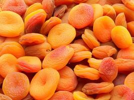 close up fresh apricots as background photo