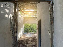 abandoned building in the forest photo