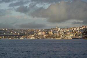 View of Golden Horn at sunset from Balat district in Istanbul, Turkey. photo