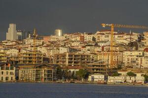 View of Golden Horn at sunset from Balat district in Istanbul, Turkey. photo