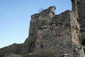 Fortress Ruins of Yoros Castle, Yoros Kalesi, or Genoese Castle, an ancient Byzantine castle at the confluence of Bosphorus and Black Sea in Anadolu Kavagi, Istanbul, Turkey photo