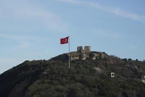 Fortress Ruins of Yoros Castle, Yoros Kalesi, or Genoese Castle, an ancient Byzantine castle at the confluence of Bosphorus and Black Sea in Anadolu Kavagi, Istanbul, Turkey photo