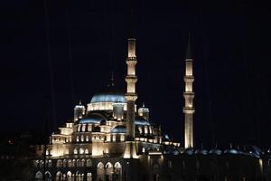 Eminonu yeni cami new mosque in istanbul turkey night view photo