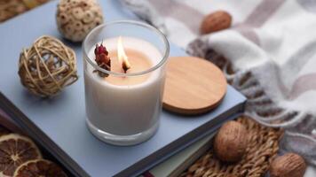 Aromatic candle on the table.  Soy candles  in a jar. Aromatherapy and relax in spa and home. Still life. video