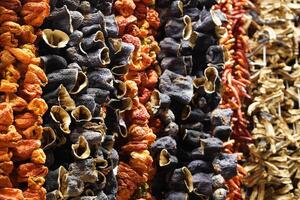 Dried eggplants , peppers , cucumbers and okra at the bazaar Istanbul market. Dried vegetables for to use at winter time. photo