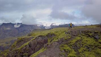 Tourists on the top in Iceland. The amazing nature of Iceland. 4k video