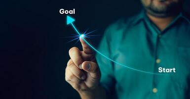 Hand point finger press start button goal. Beginning goal new target. Point to success business. photo