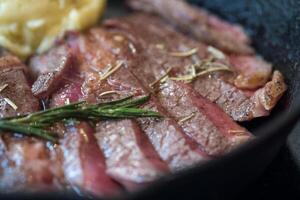 Grilled sliced beef steak serving platter, recipe idea photo