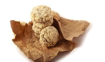 Shortbread with nuts and seeds in craft paper photo