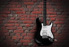 Electric guitar on red brick wall background photo
