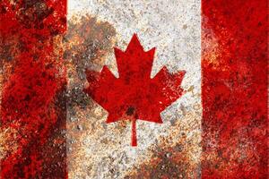 Canada flag on rusty metal background texture photo